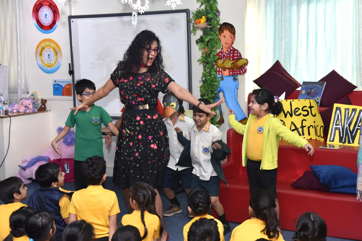 "Can you fly like Koko the Crow?" Storytime in the library of Ecole Mondiale, Bombay, January 28, 2016