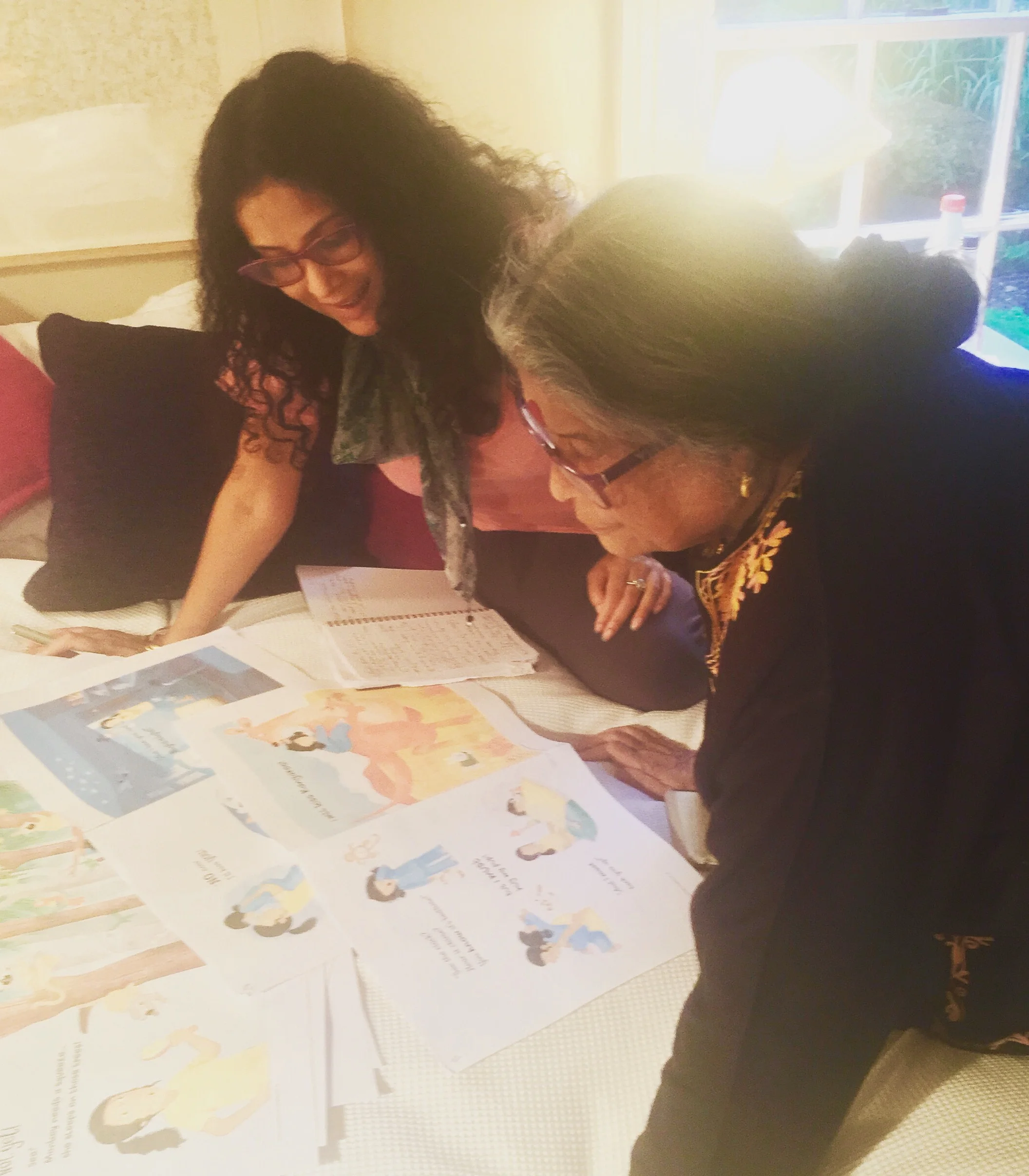 Nandana and her poet mother Nabaneeta Dev Sen pore over the proofs of Kangaroo Kisses , in Essex, UK