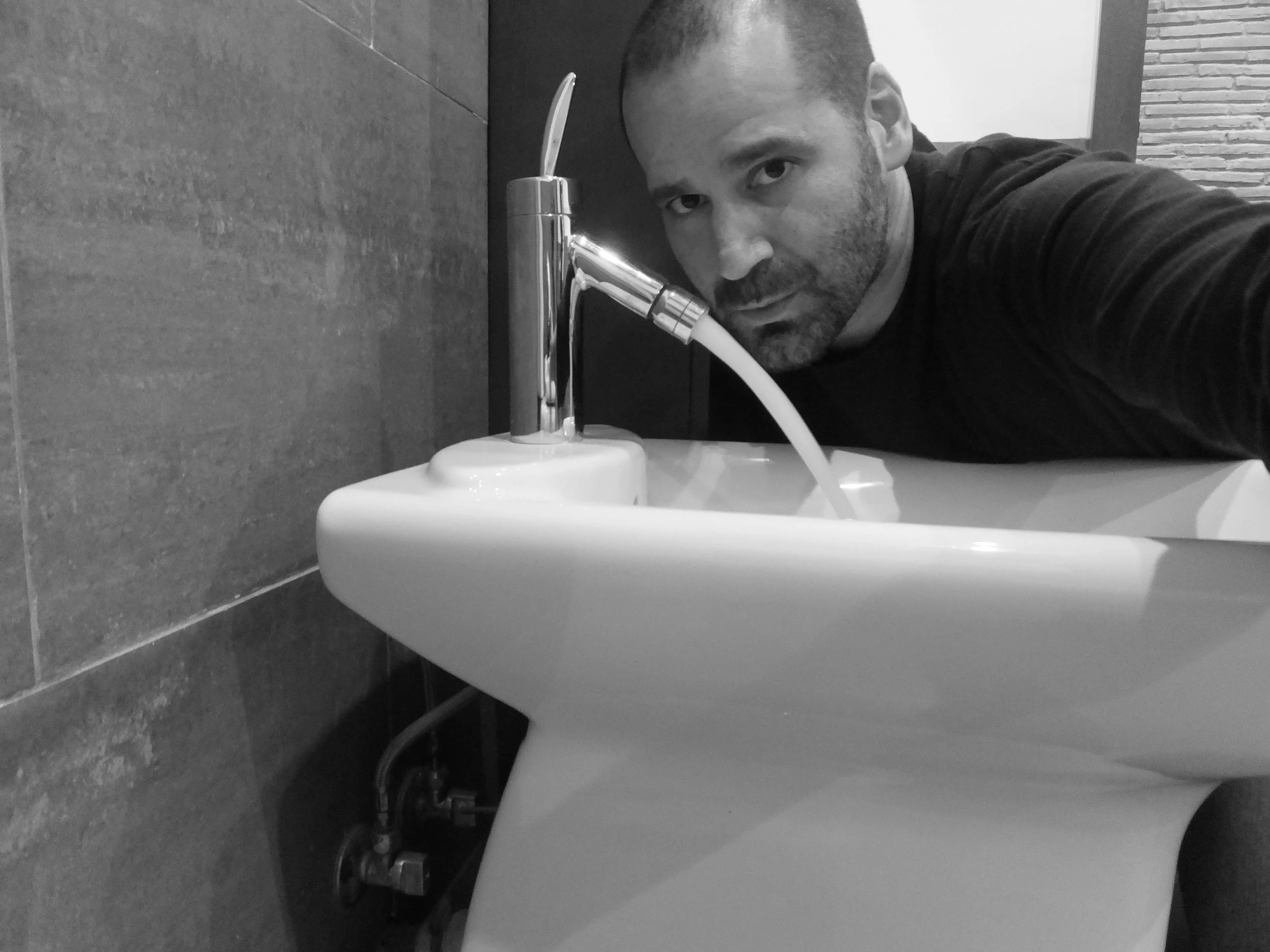 Not drinking from the fountain in Barcelona, Spain.