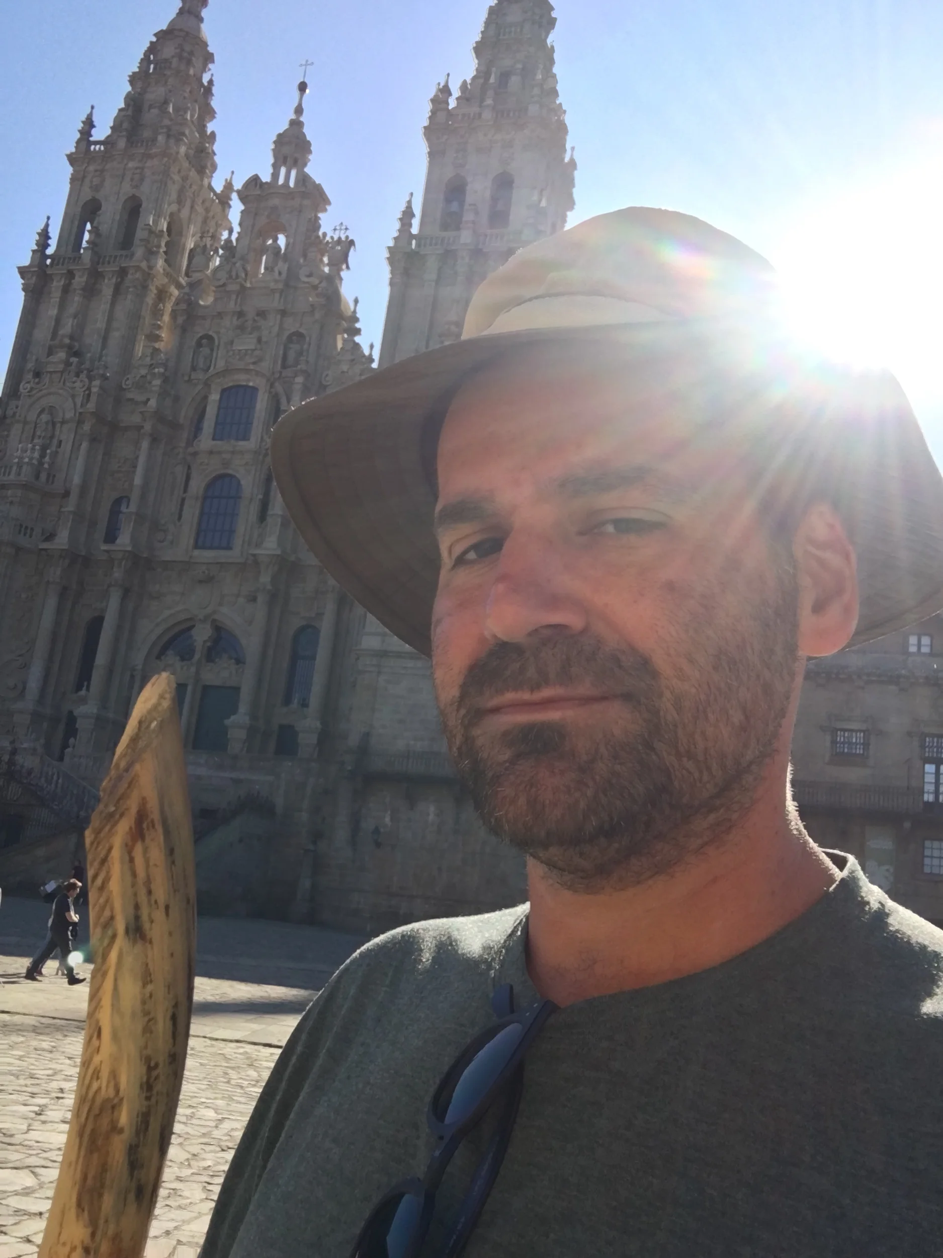 A pilgrim with his walking stick in Santiago de Compostela, Spain.