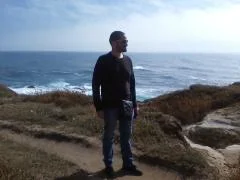 Man of the earth on the coastline in California.