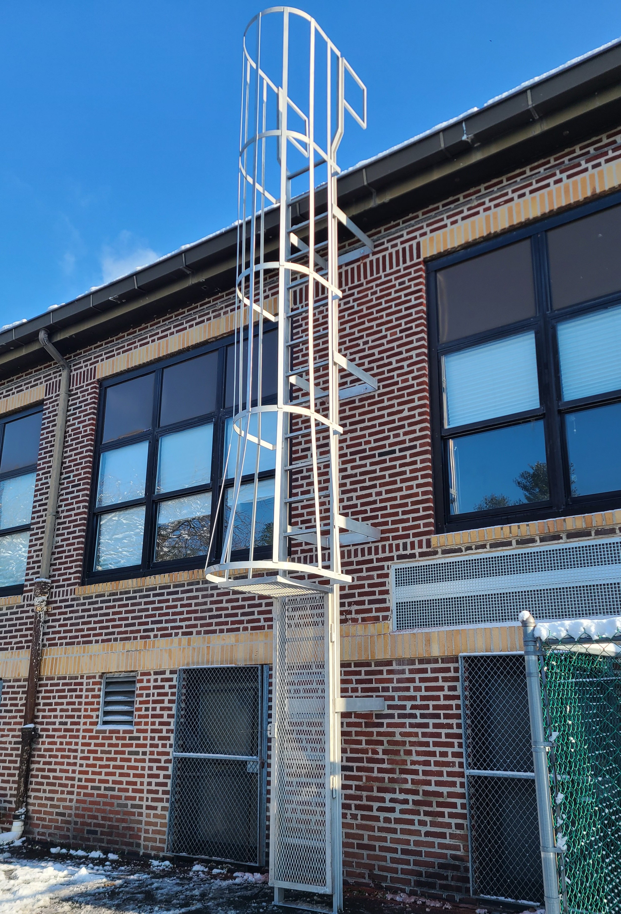 Roof ladder with guard. Somerville, NJ