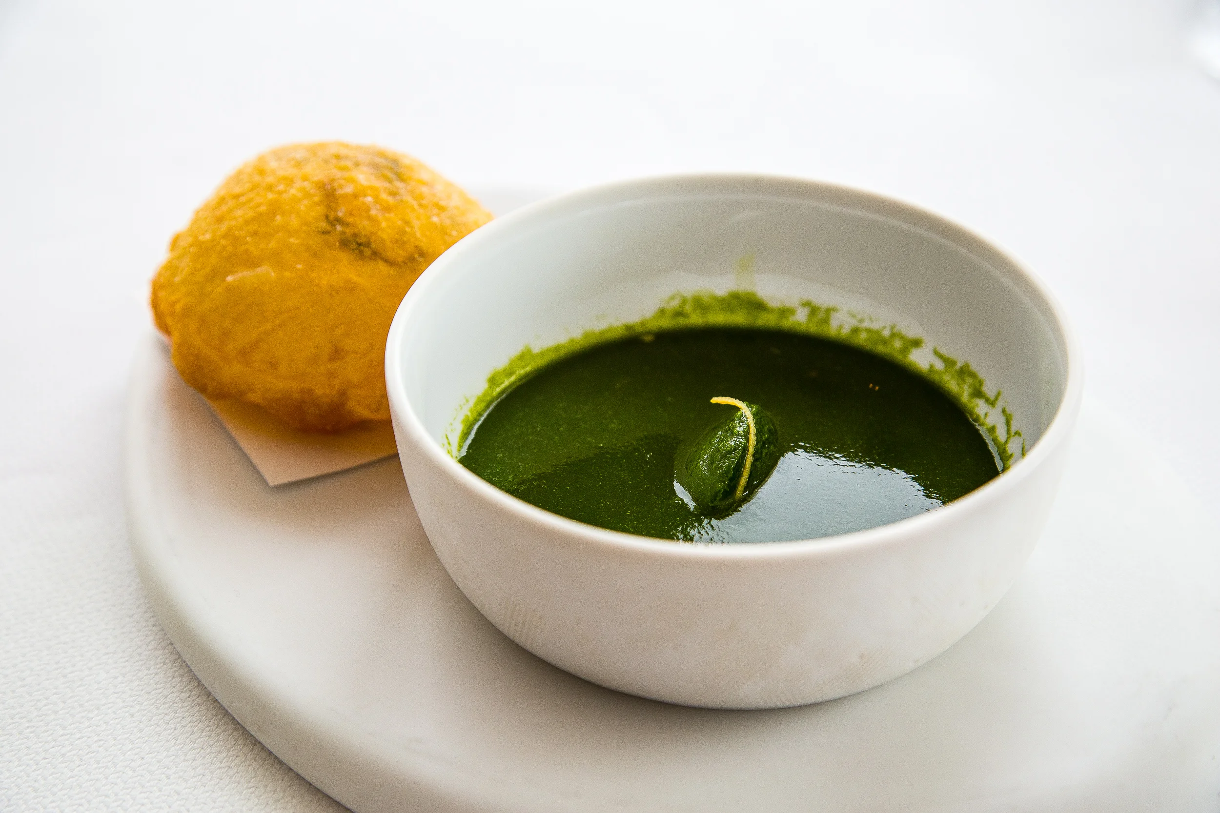 Fried, hollow puff filled with anemone and a soup also with anemone.