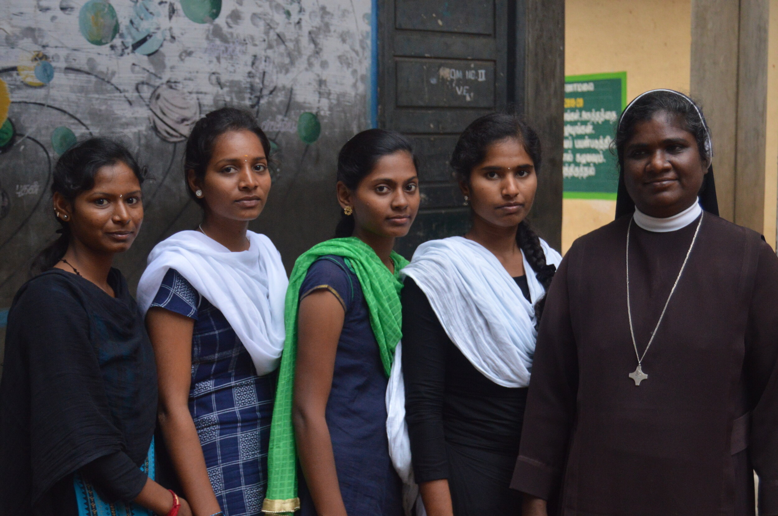2. Arulrasi and her friends along with the Principal of BEd College, TVM came and helped us.jpg