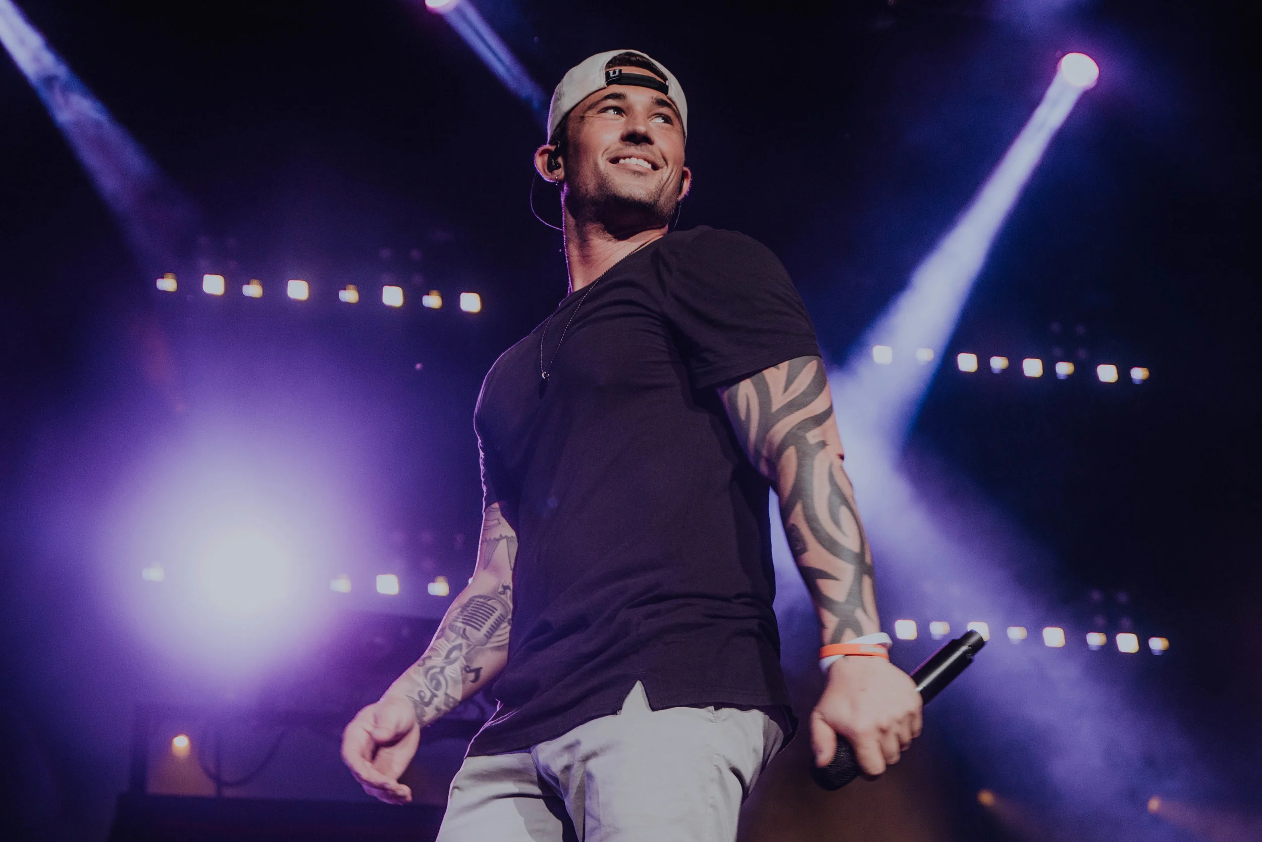 Michael Ray at Ascend Amphitheatre in Nashville, TN for CMA Fest on June 9th I think Michael gets more and more popular in the country scene every year. Such a fan of his music and the energy he brings to a live show. Also a sucker for the purple lights in this shot, too.