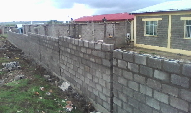 Fence separating boys and girls dorm.jpg