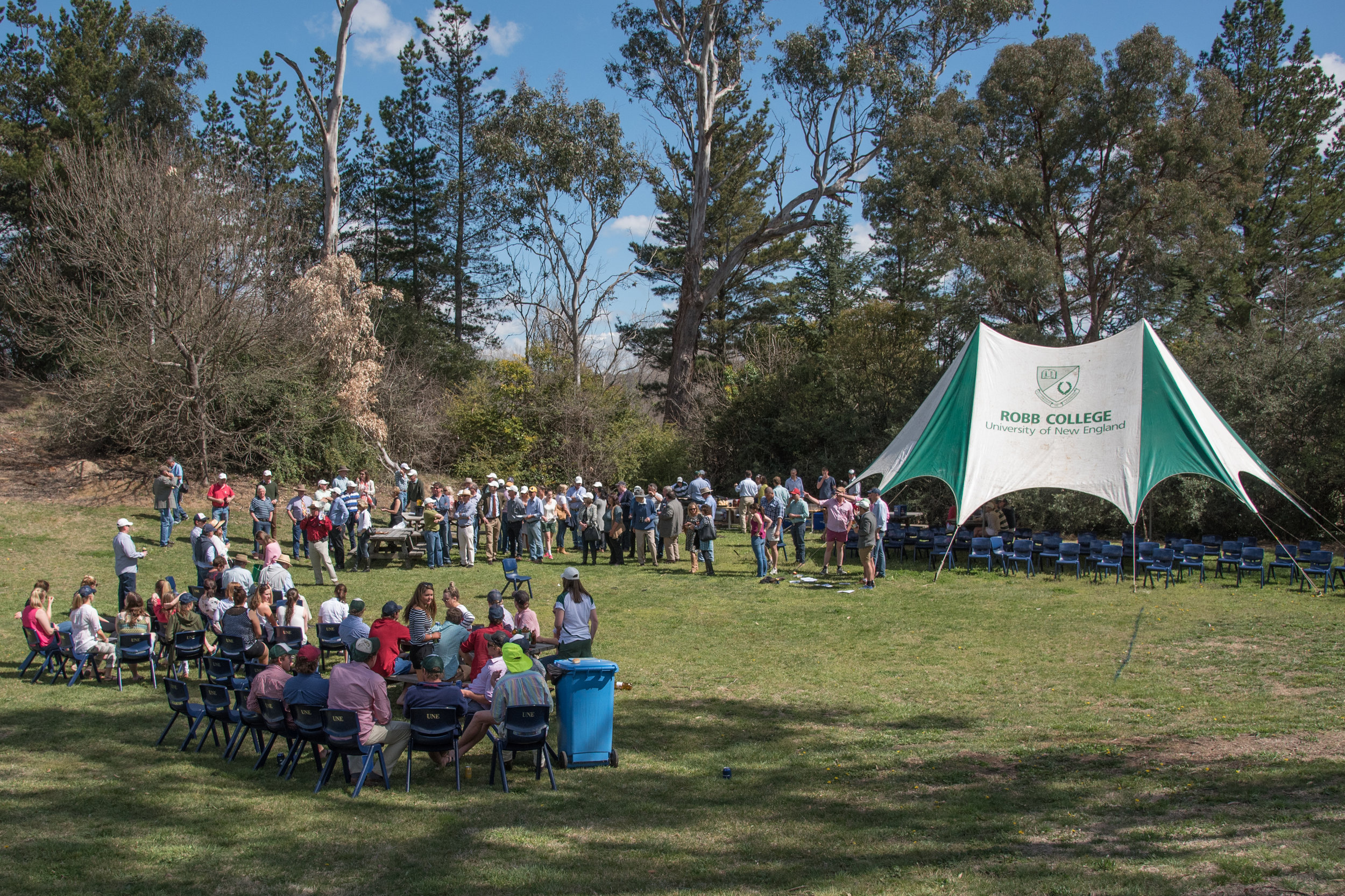  Robb College Tent surrounded by people during 2015 Alumni Reunion    