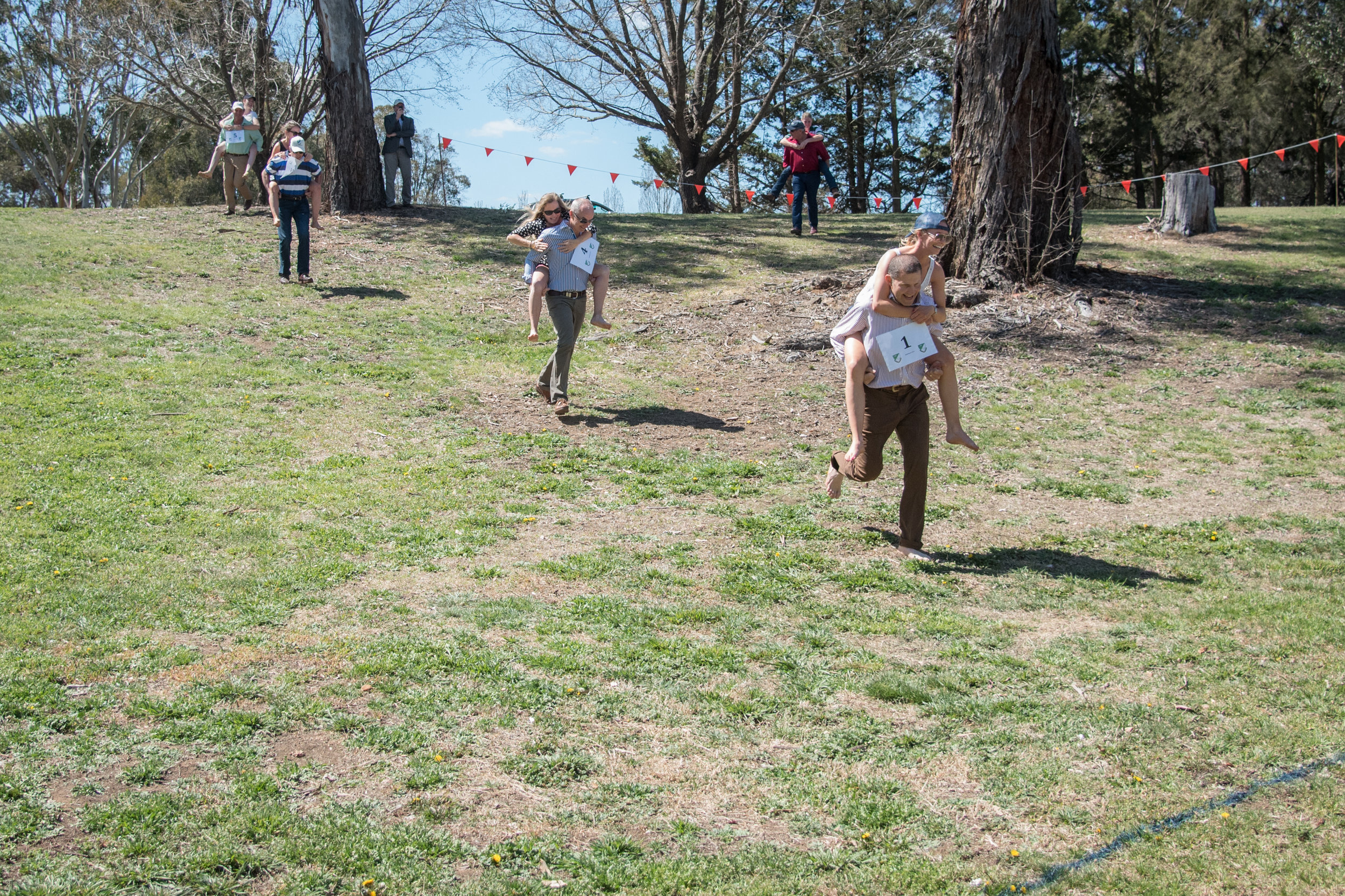  Alumni-Student piggyback teams racing toward finish line in the 2015 Robb Races    