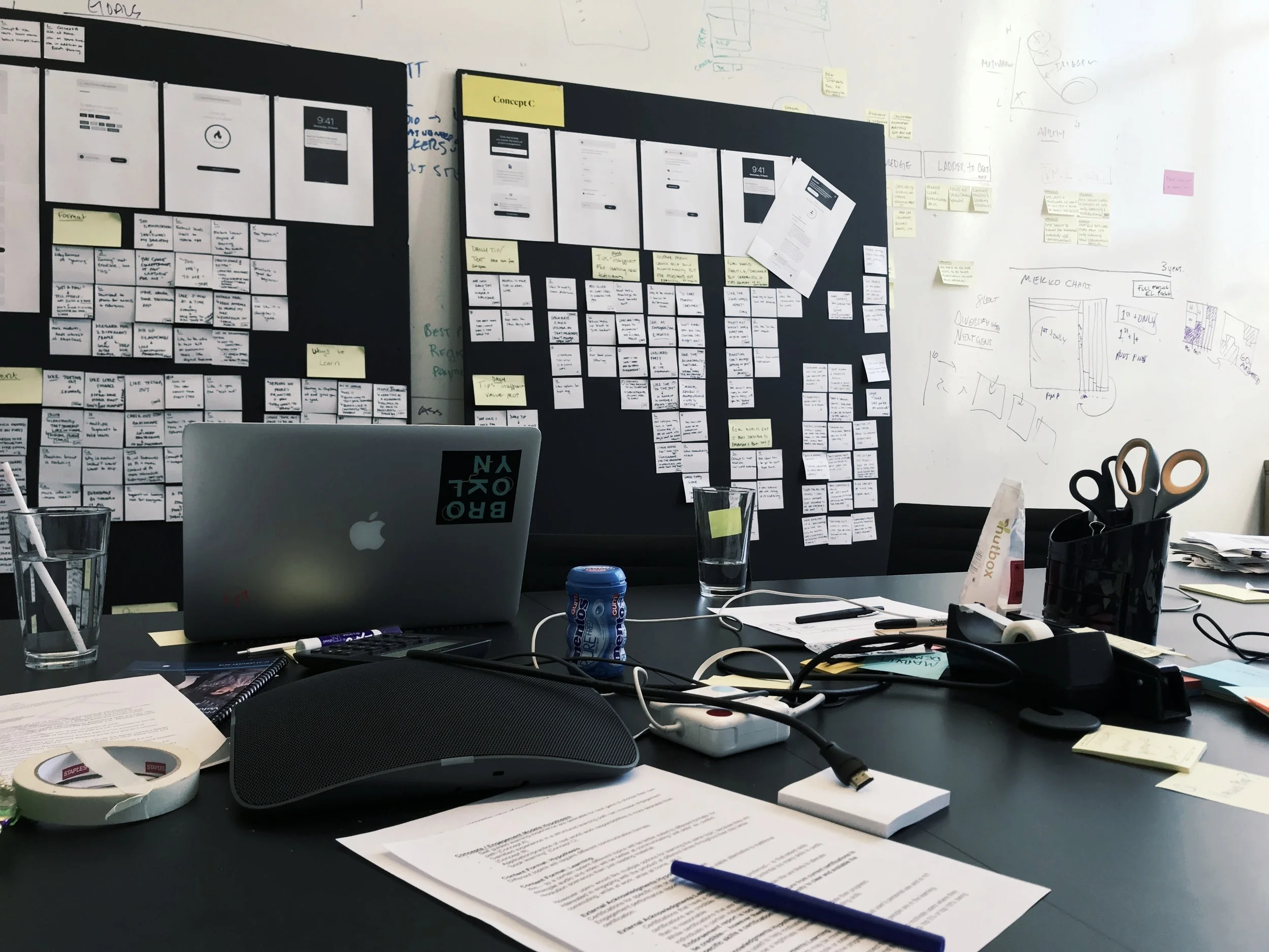 A day in the life photo // I’m now a pro at pin-ups, capturing quotes on post it notes and theme-ing research insights post-sessions