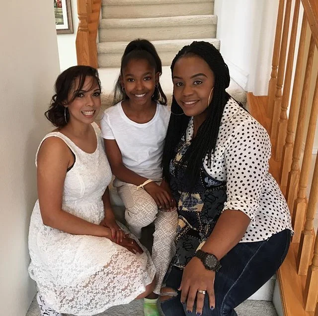 The bride, Jr. Bridesmaid, and Matron of Honor