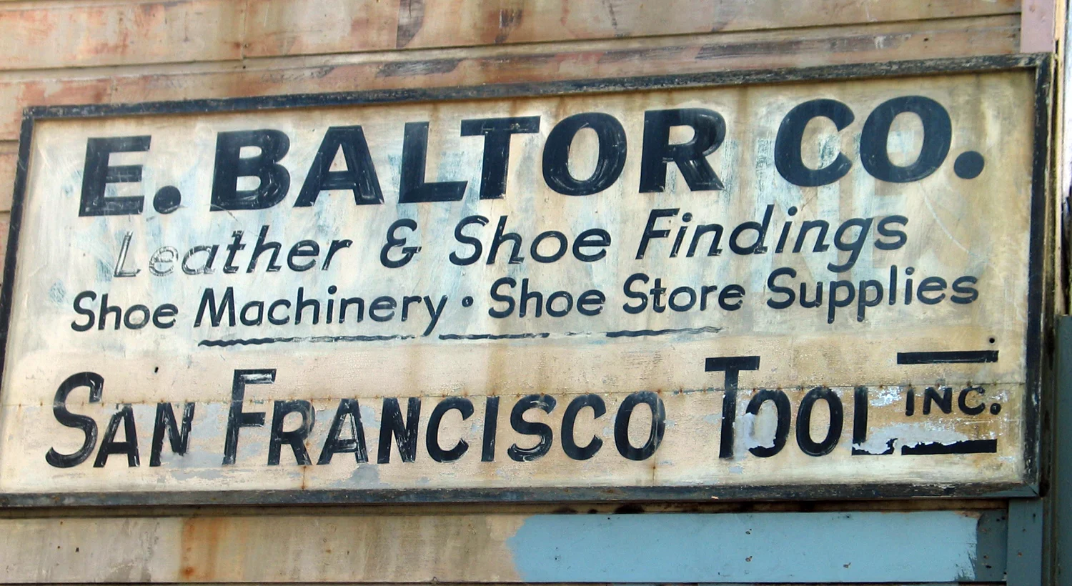 E. Baltor Co. A sign I found in the Mission District in 2001. No longer there.