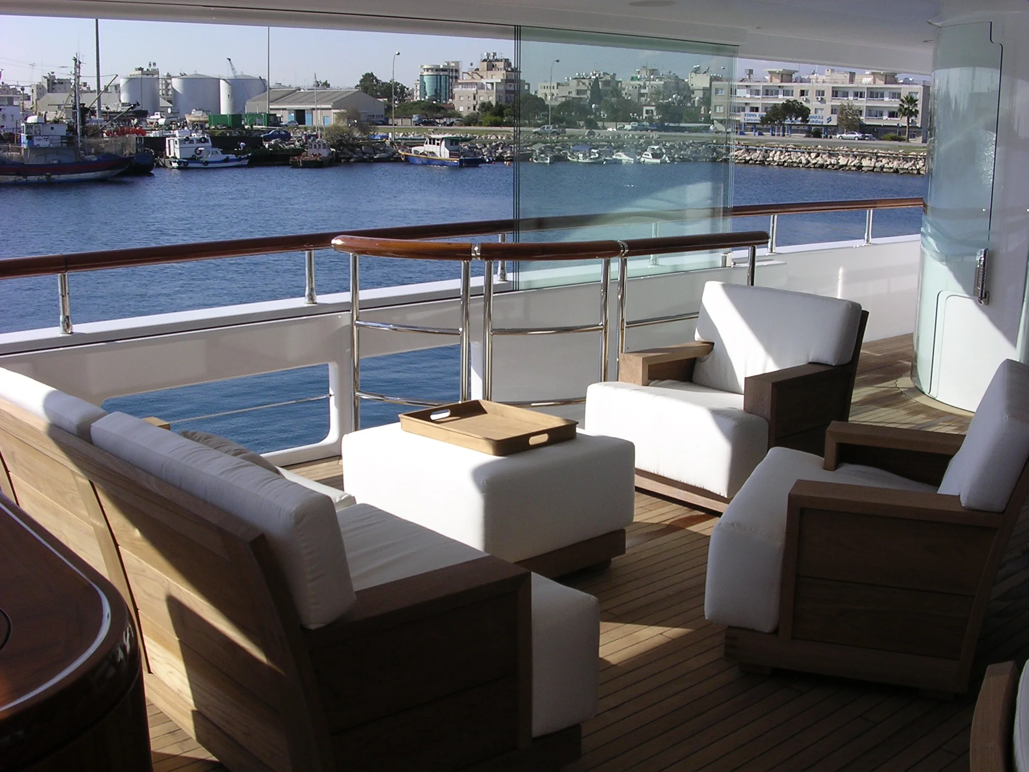 Solid teak two-seater sofa and deck chairscommissioned for a private client.