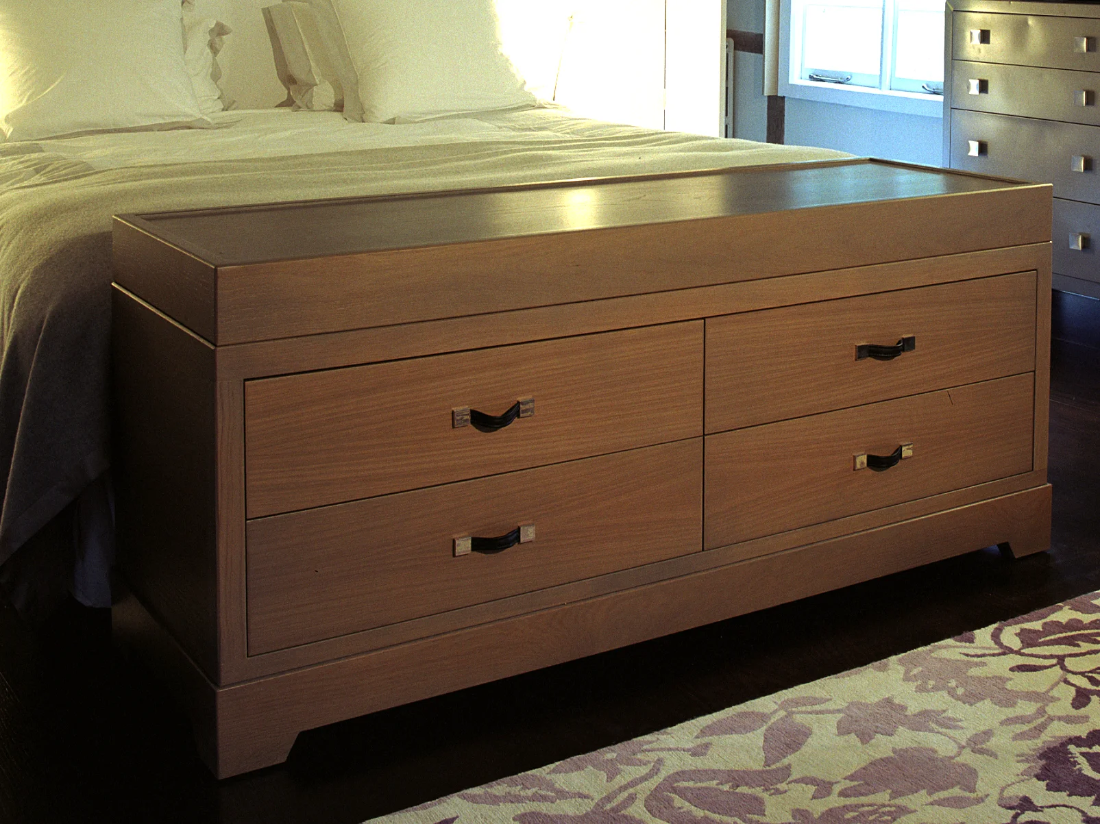 Solid wood end-of-best chest with drawers and remotely controlled TV lift in lid