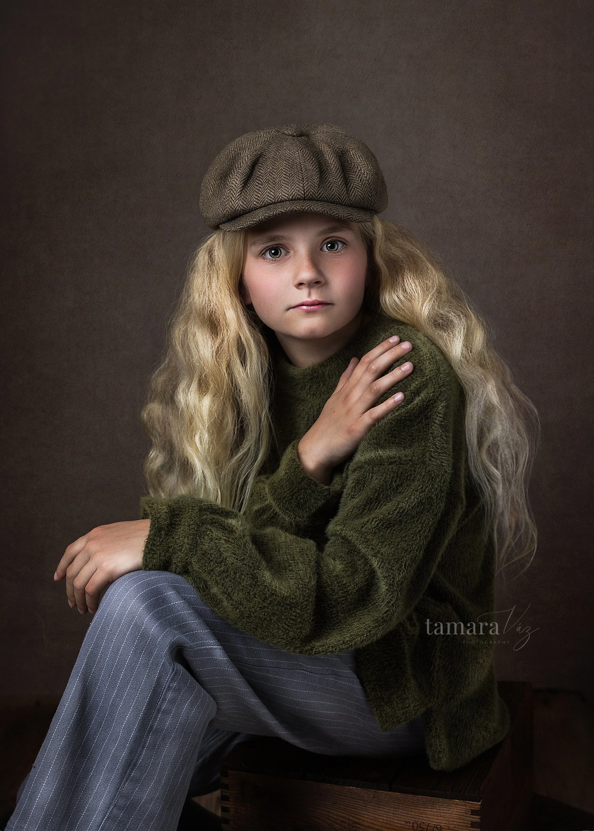 Blond girl with curly hair posing for a fine art photo in Lincoln Park NJ studio