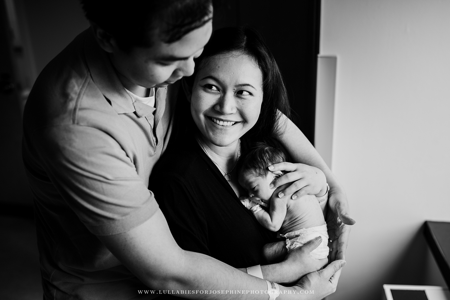 New Parents holding newborn boy at overlook hospital NJ