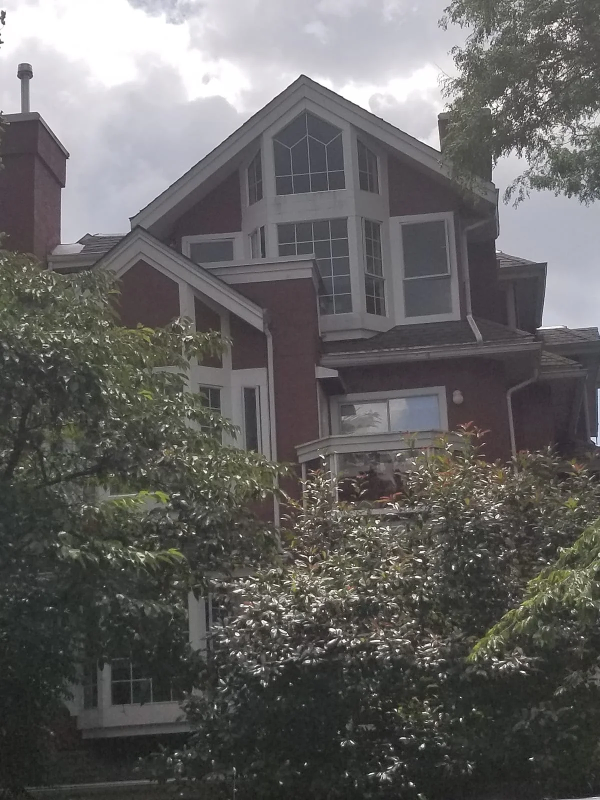 Commercial Drive  Condos- Restoration Caulking for Exterior Windows.