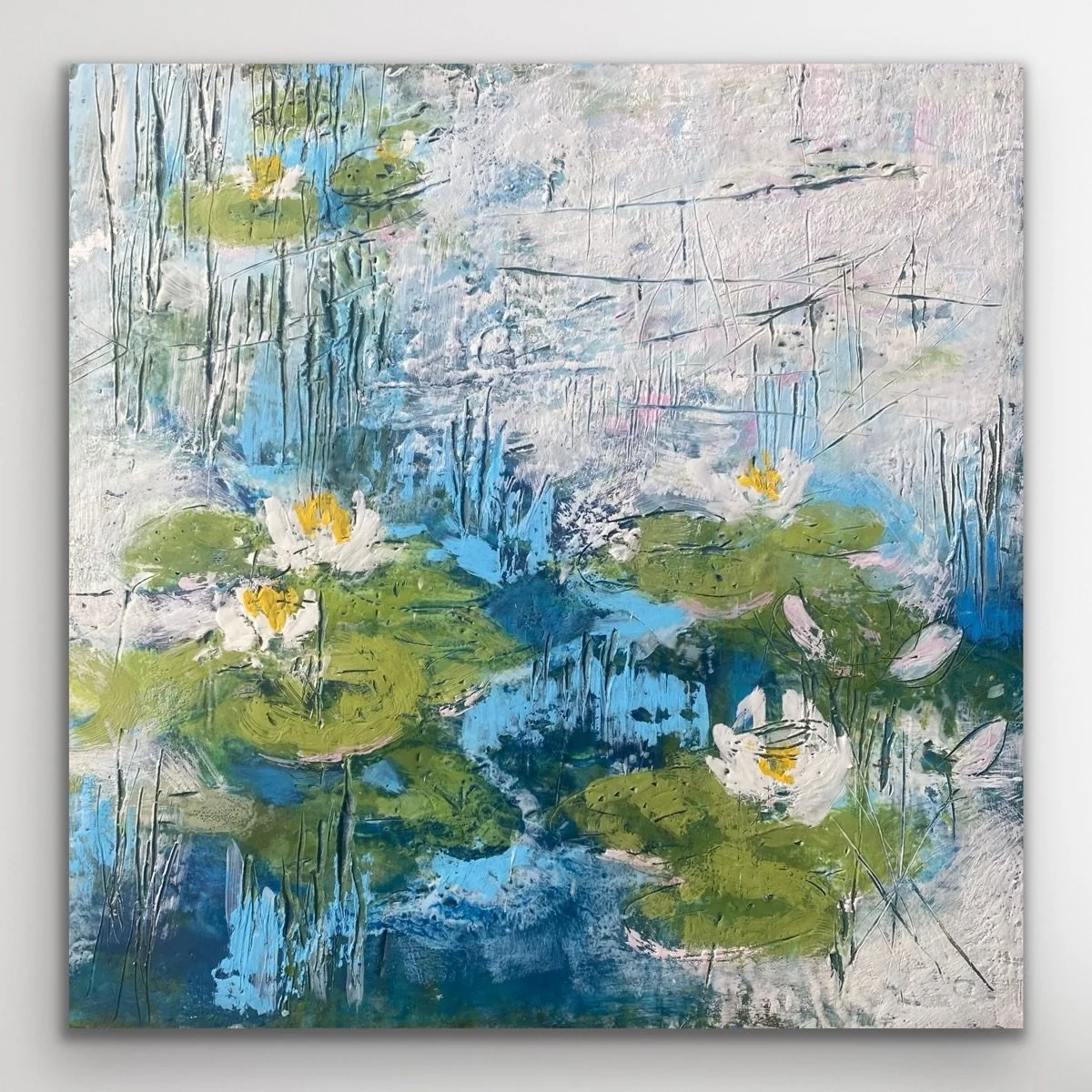 NEW✨ Excited to have a beautiful new encaustic painting by Ann Shire in the gallery! From her lily pond collection this new work is filled with pops of colour and fabulous textures. 

&ldquo;Floating Dreams&rdquo; 20x20&rdquo; encaustic painting $800