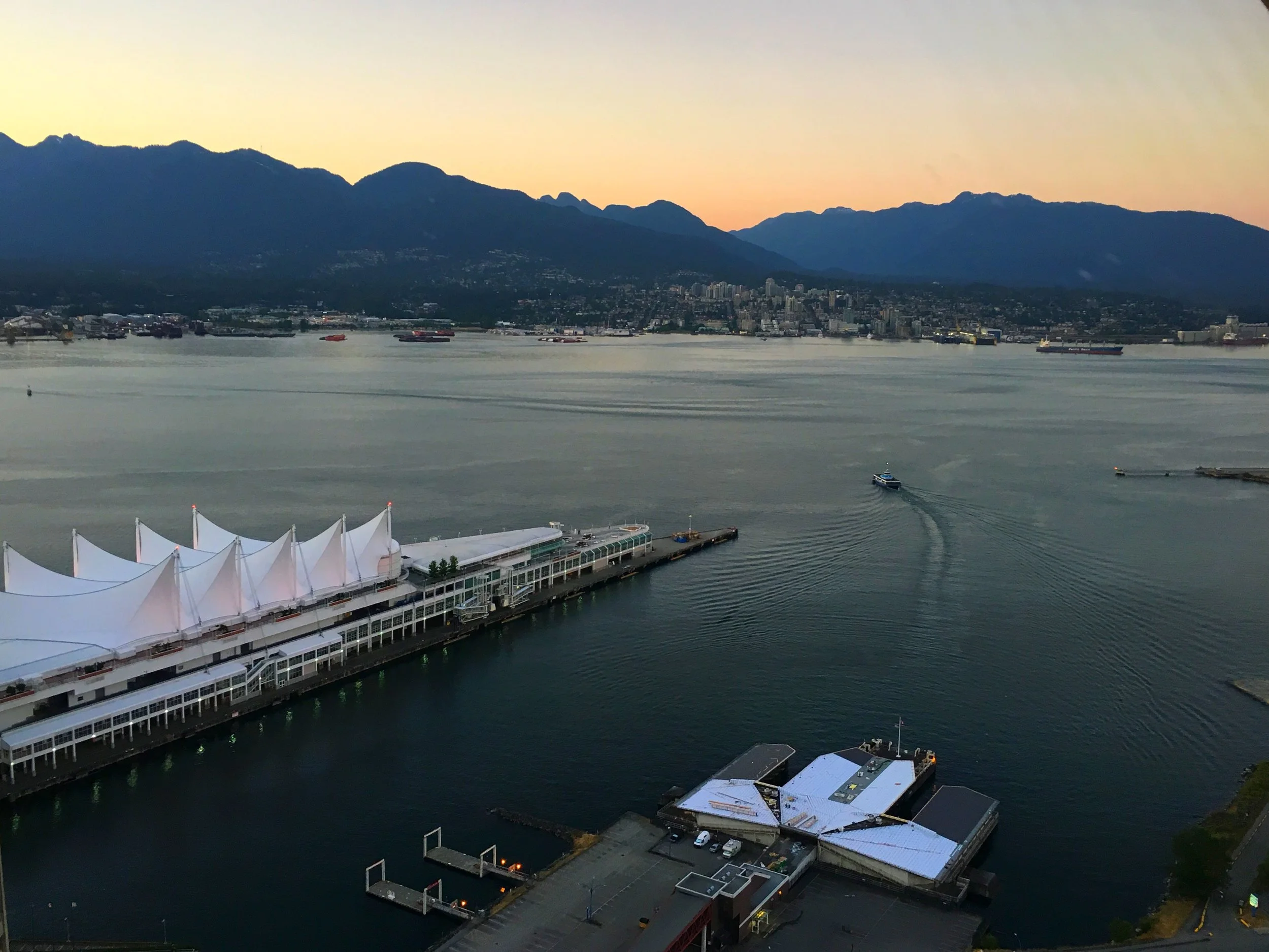 Canada Place from an observation deck at dusk.