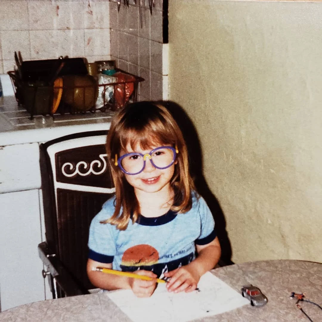 Little Caitlin circa 1984, playing business manager the old school way.