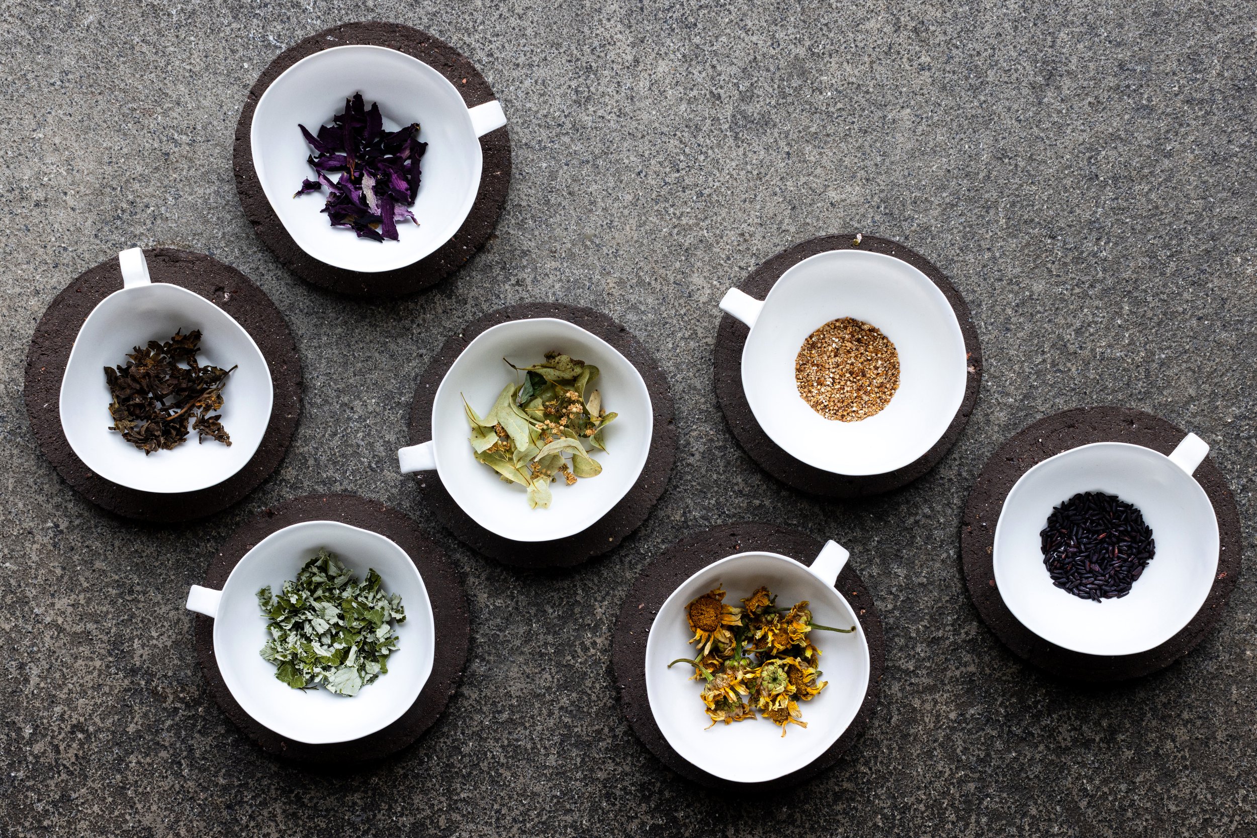 Grass-fed bone china tea cups and farm soil saucers