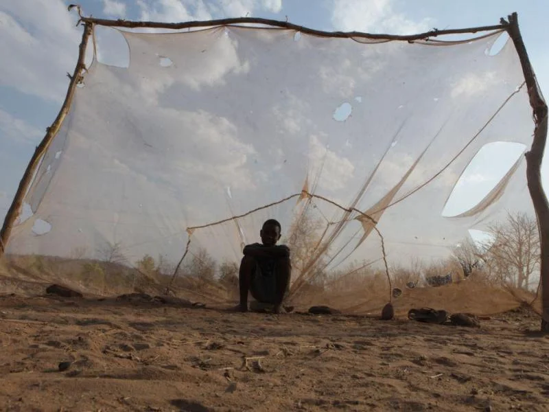 A mosquito net being used as a goal post net in Zambia (Photo by Moisés Mwape, AP 2014)