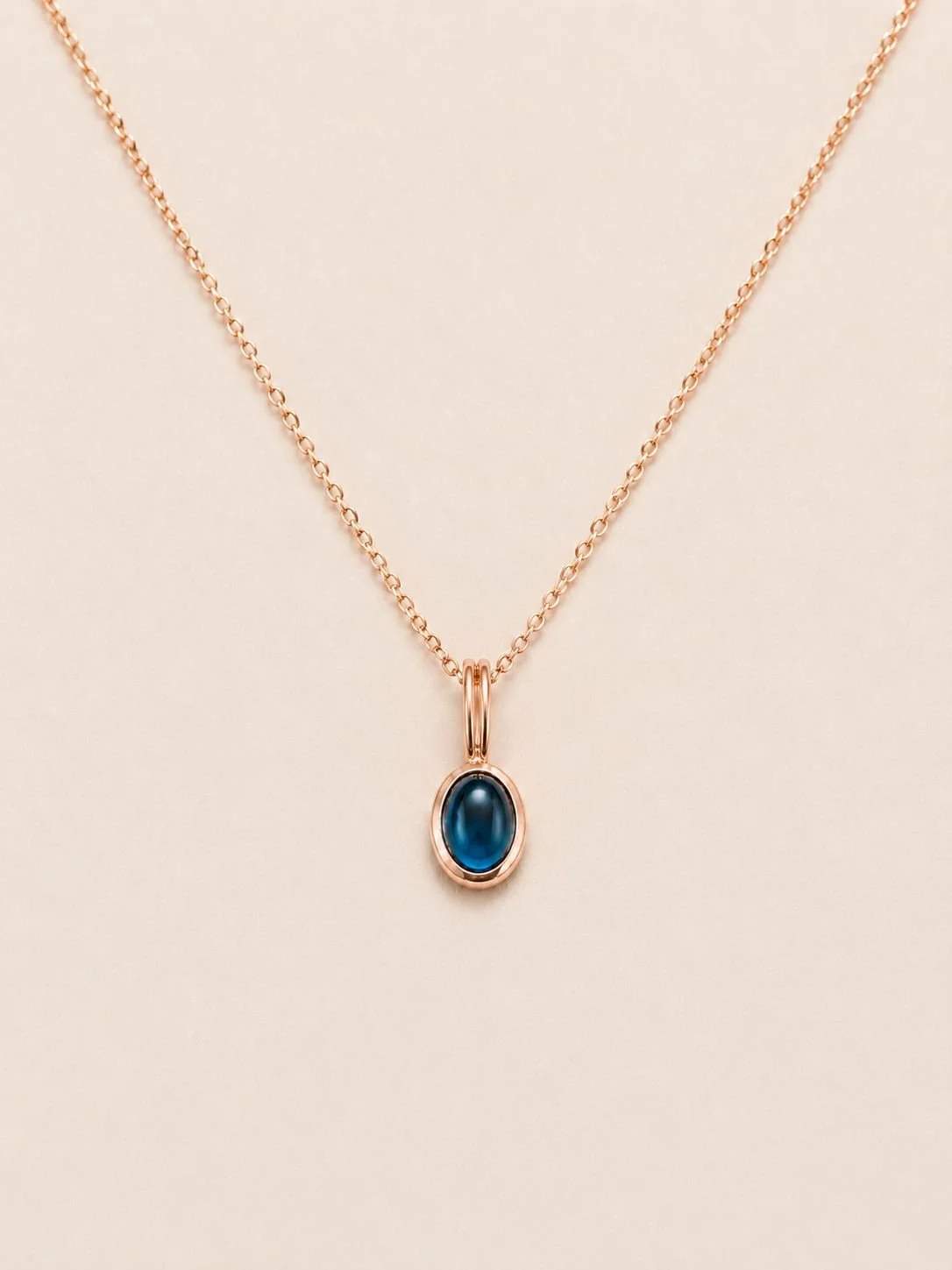 ciondolo-con-topazio-blu-oro.jpg