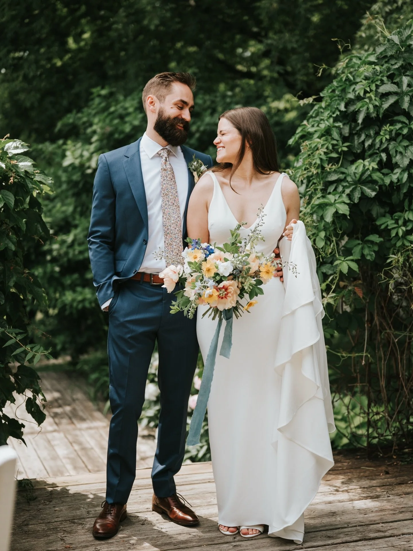 I took this photo on K&amp;M&rsquo;s back porch just as we were coming back inside the house after their first look and portraits. I turned to look back at them, got really excited and was all &rdquo;Oh wait! The lighting is so good here&rdquo;. I ga