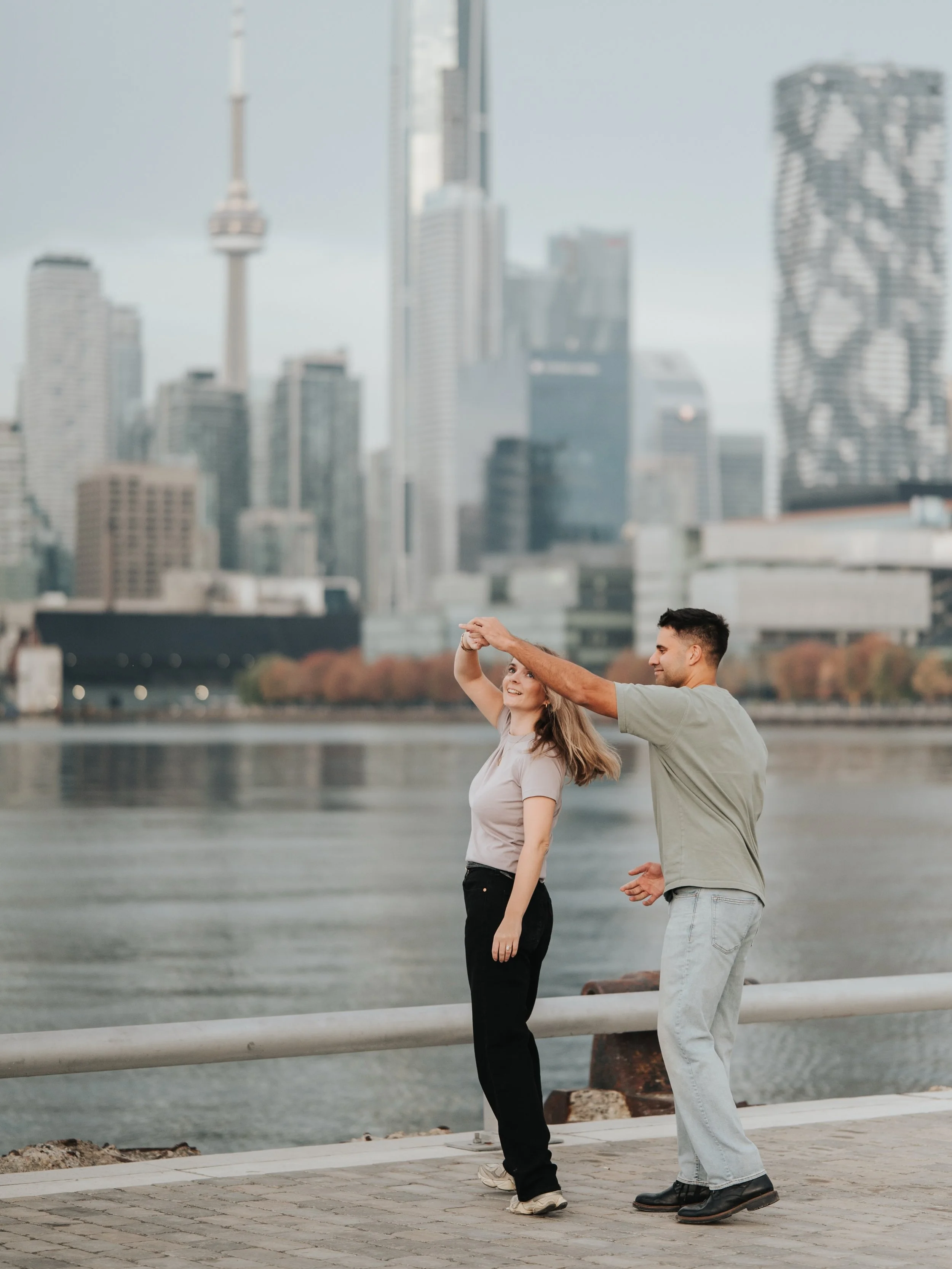 A sunrise engagement in the city 🏙️ 

The CN tower is something these two get to see everyday from their window and I think including it in their engagement session will help make these photos super nostalgic one day. 

Documentary wedding photograp