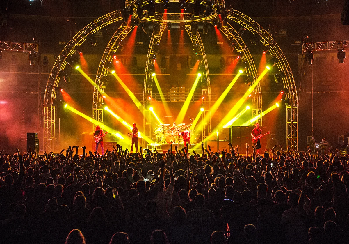 311 crowd with hands in air yellow_orange.jpg