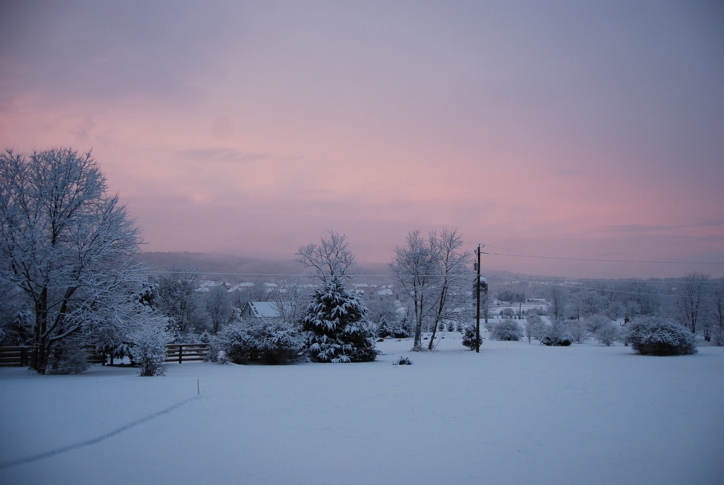 Snowy landscape with sunset wide view.JPG