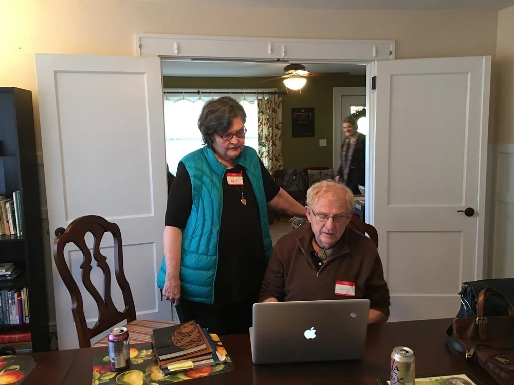 pop up Lyn+&+John+Reviewing.jpg