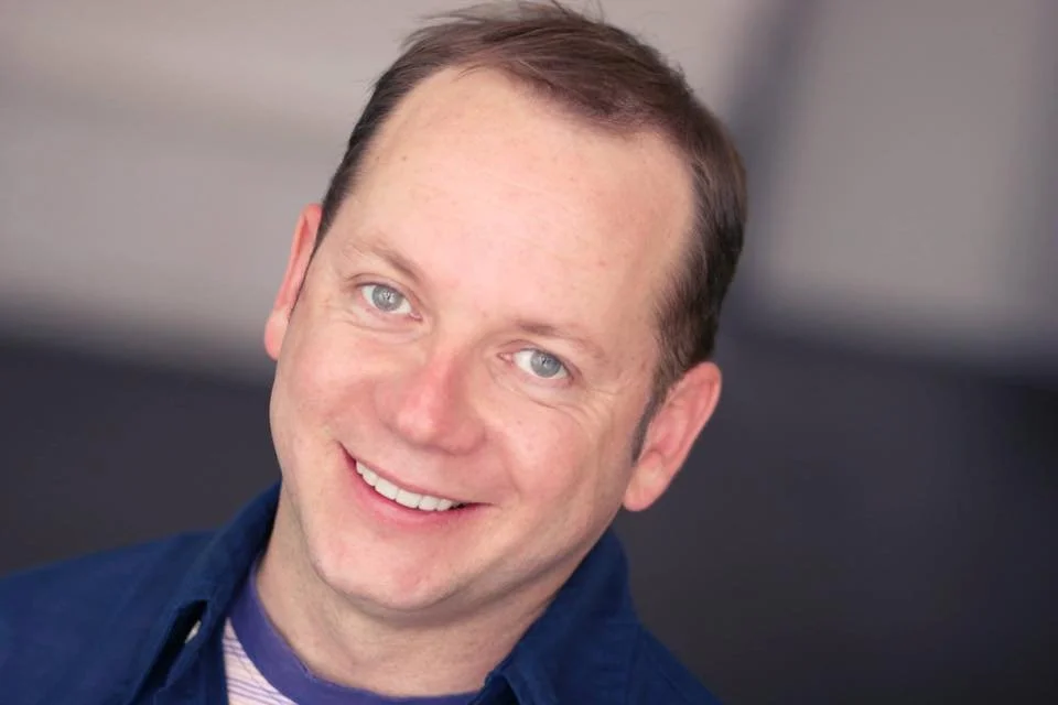 Tom Chalmers in blue.jpg