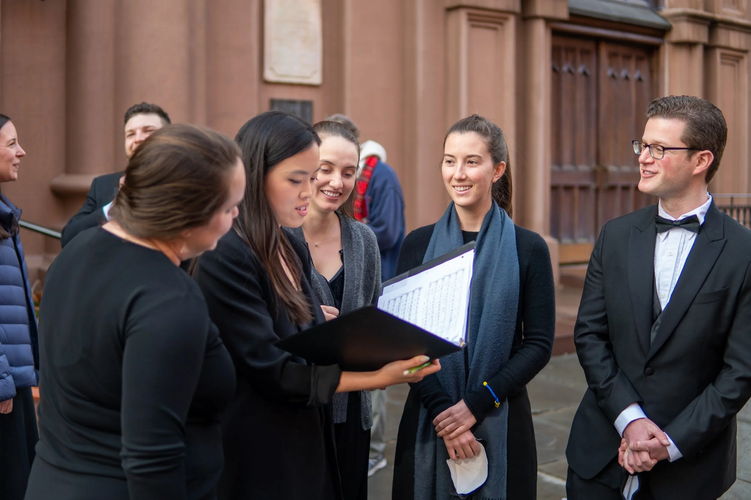  Singers outside the concert venue 