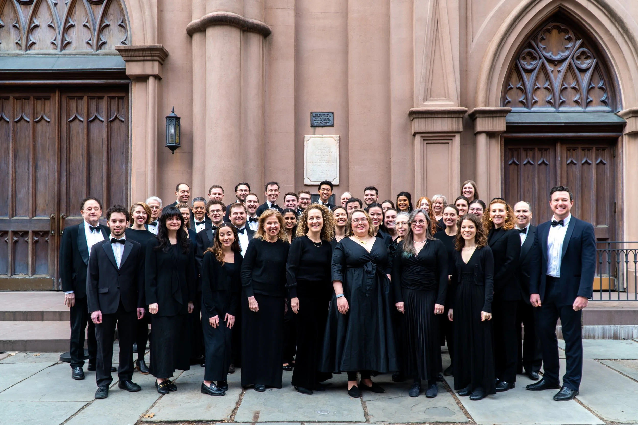  The choir in concert attire gathered outside the venue 