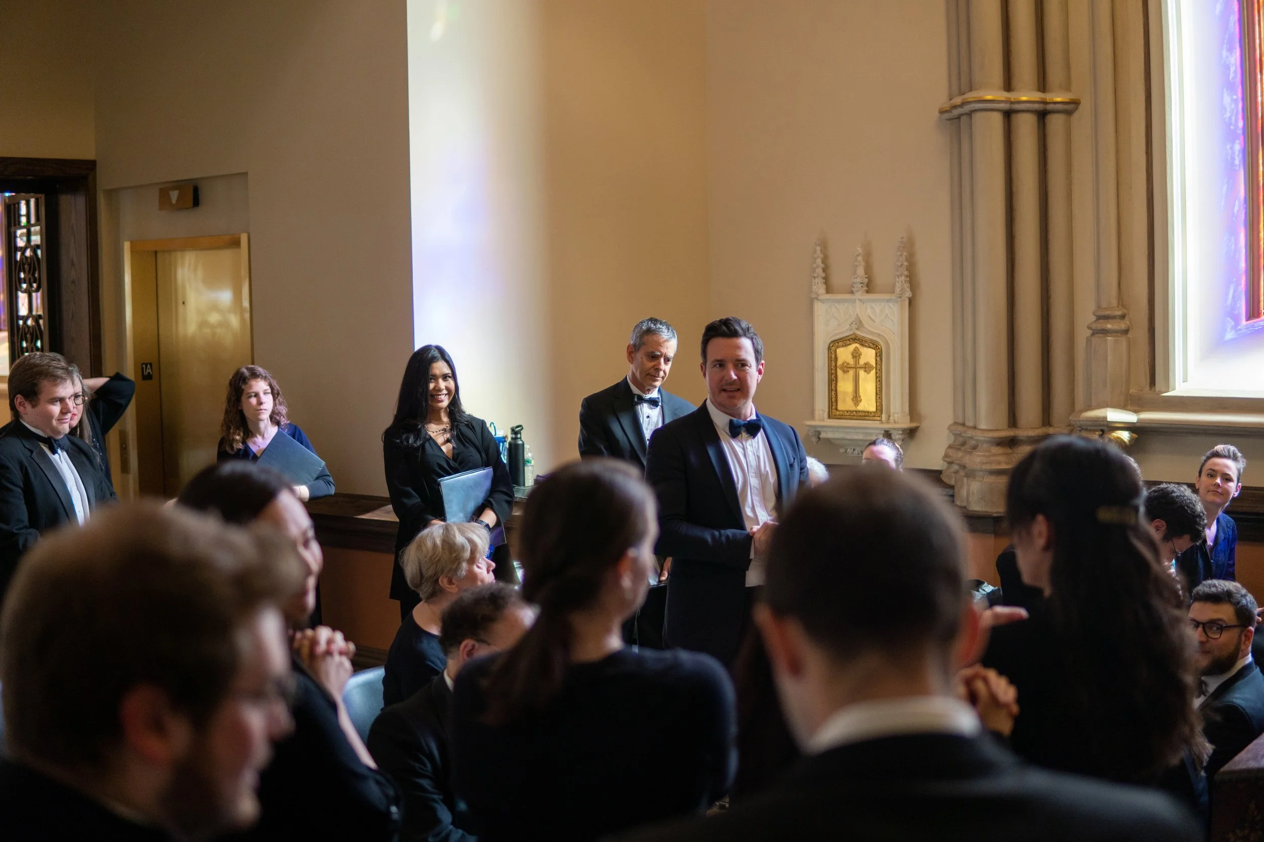  Director Brandau addresses the choir just before the performance 