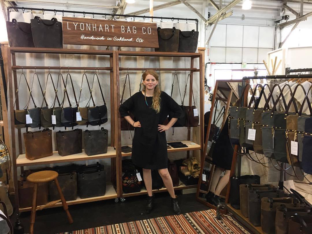    Lyonhart Bag Co.    Niamh Lyonhart runs her company out of her East Oakland warehouse studio, where she also makes all of her bags by hand. Her materials are sourced locally and domestically, when possible. Bonus: all of her bags still ring in und