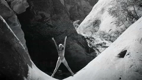Would activist Katie Lee be hated for this pose on social media? Quite possibly. A strong advocate for preserving Glen Canyon, the canyon was later dammed. Credit: National Geographic