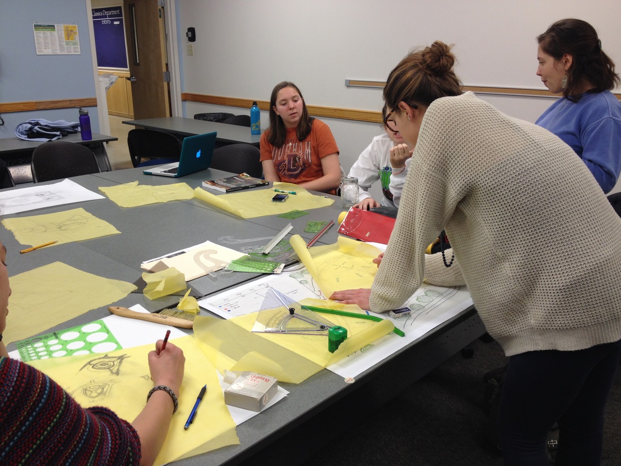 Garden members getting hands on during a design meeting.