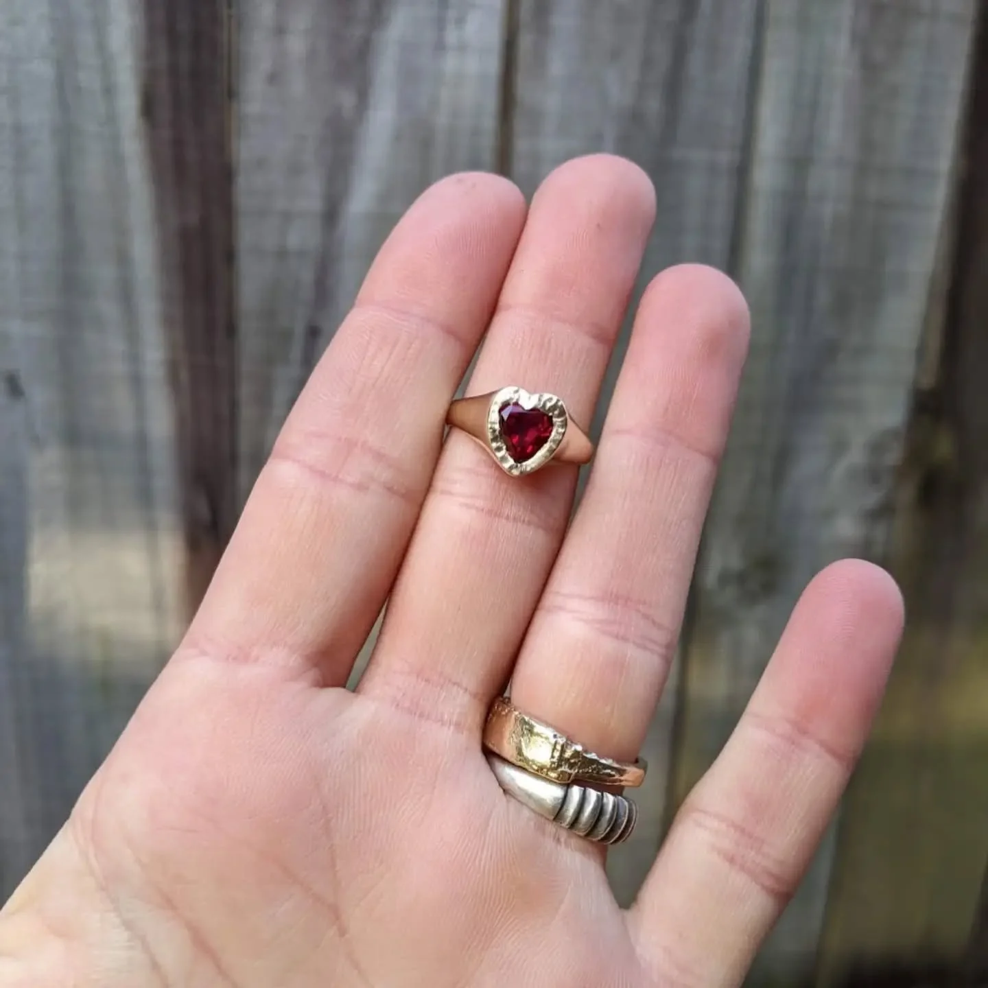 Big ruby heart in gooey 9k yellow gold for Ash 🤩
I love all of the different processes that come together to create such special custom pieces

The balance between the high polished band and the hammer marks left behind from setting the gemstone. 

