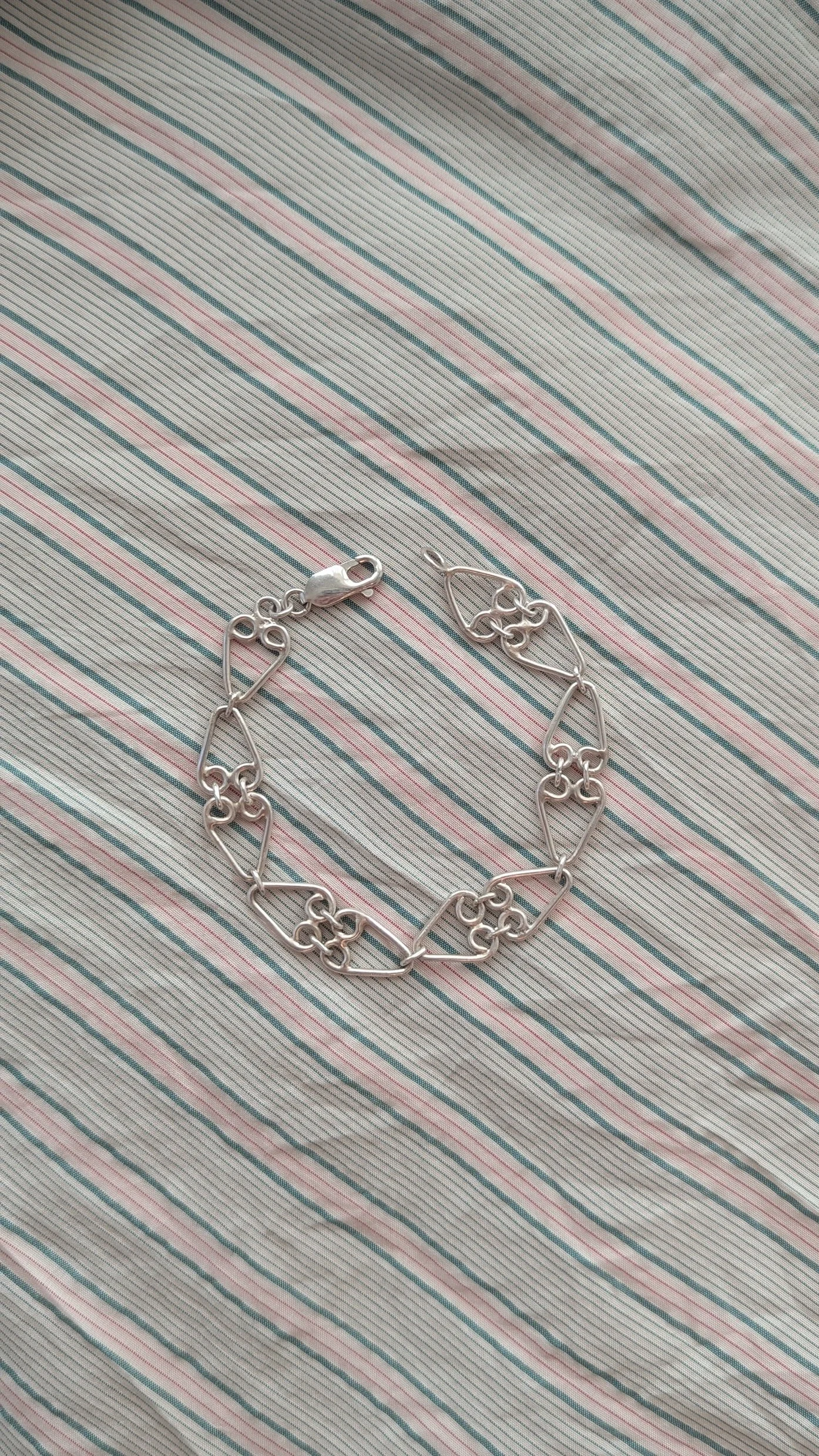 Handfabricated cherub chain