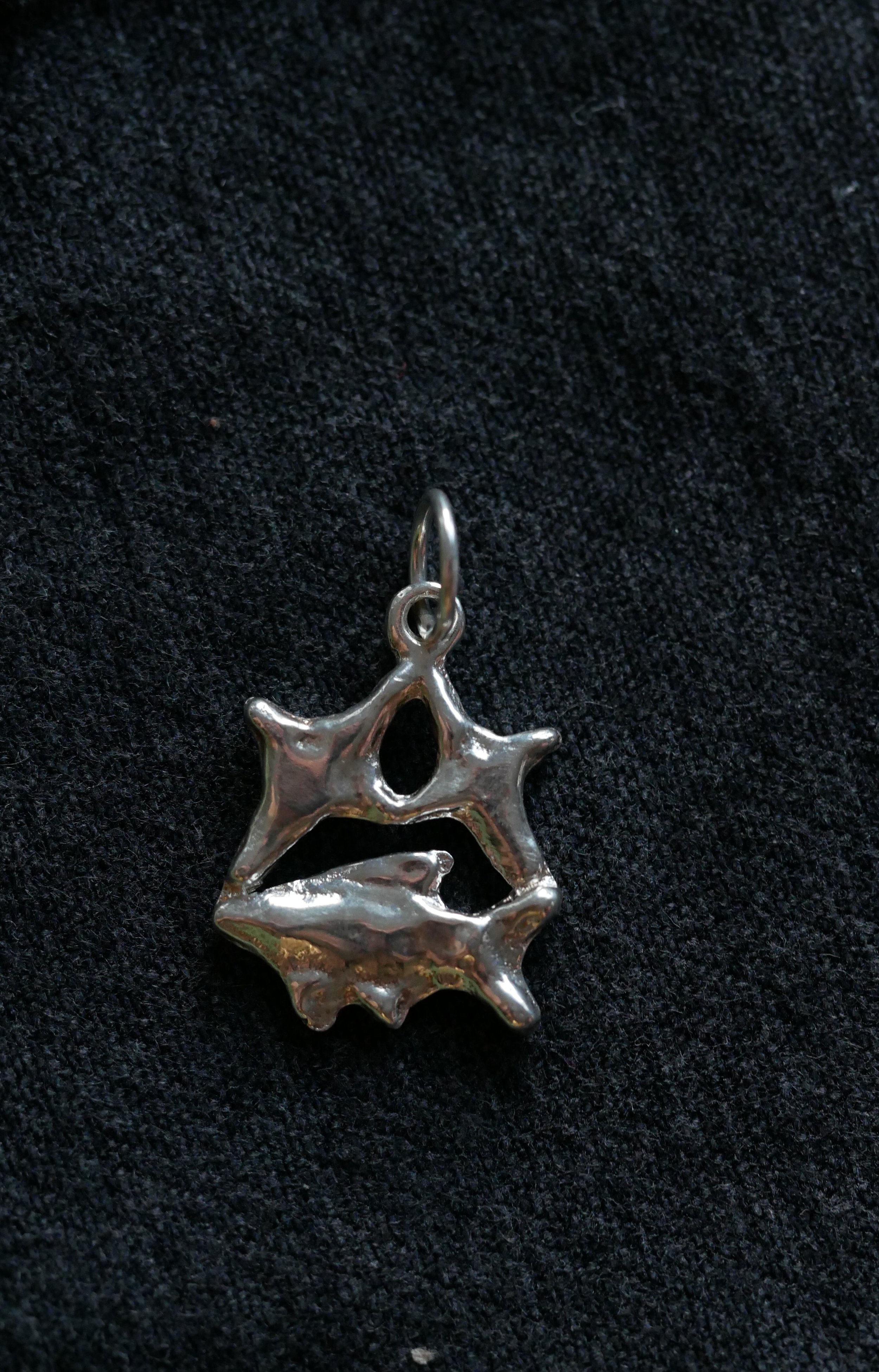 Above + Below Charm