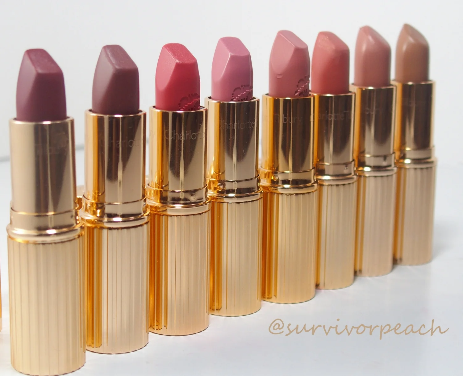 Charlotte Tilbury lipstick collection. My favorites are Bitch Perfect and Sexy Sienna.💋 From bottom: Red Carpet Red (matte), Bond Girl (matte), Miranda May (matte hot lips), Liv It Up (matte hot lips), Kidman's Kids (matte hot lips), Sexy Sienna (matte), Bitch Perfect, and Hepburn Honey.