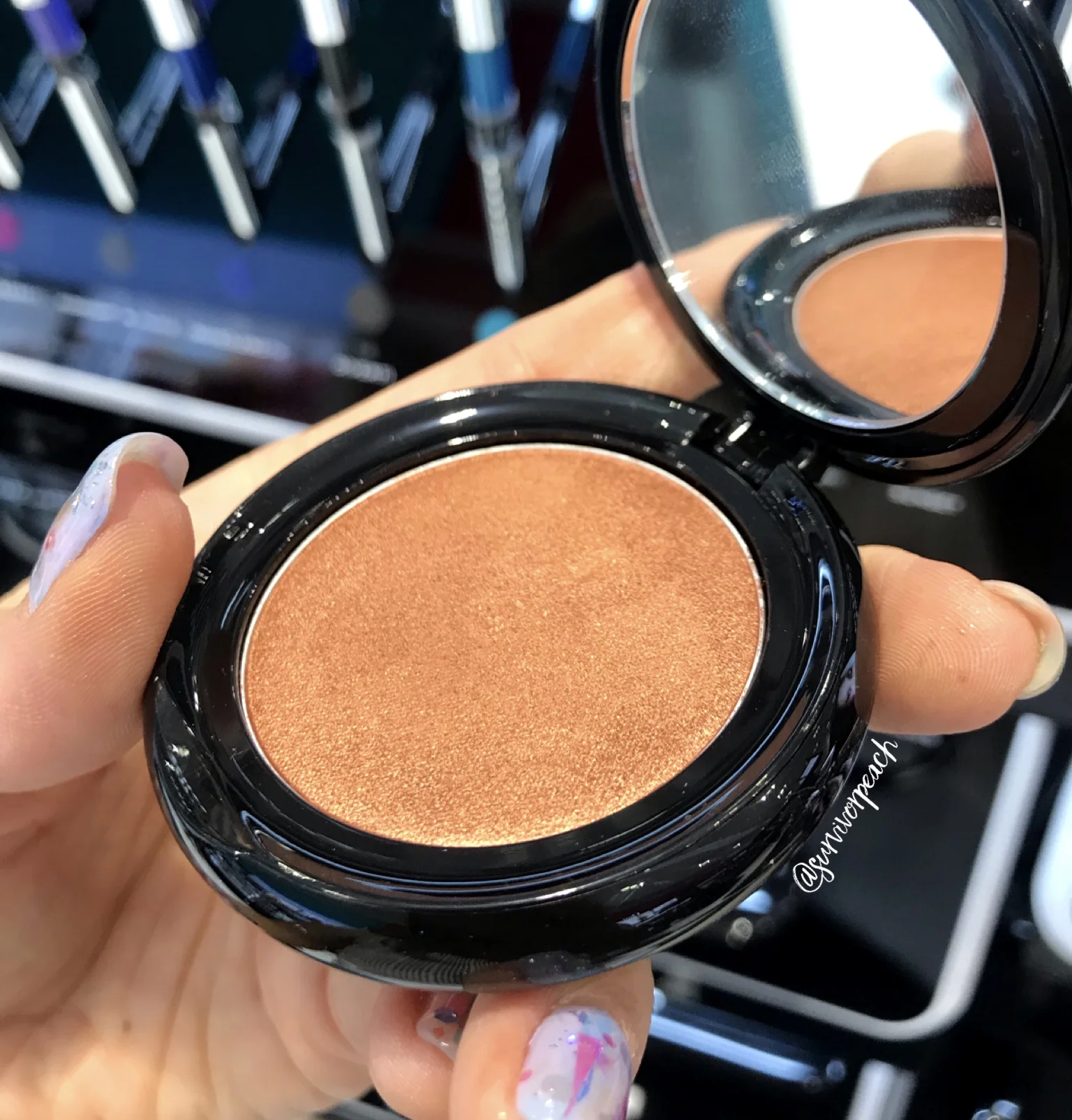 Swatches of the Marc Jacobs Beauty O!Mega Gel Powder Eyeshadow in O!MG