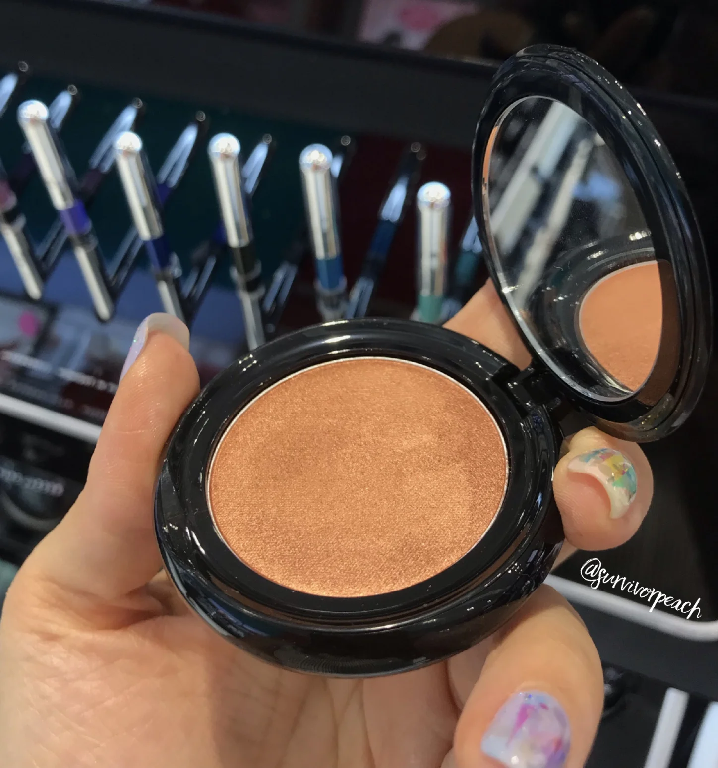 Swatches of the Marc Jacobs Beauty O!Mega Gel Powder Eyeshadow in O!MG