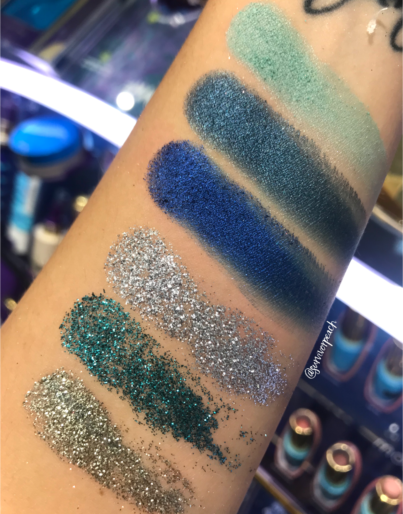 Swatches of the Tarte Rainforest of the Sea™ high tides &amp; good vibes eyeshadow palette