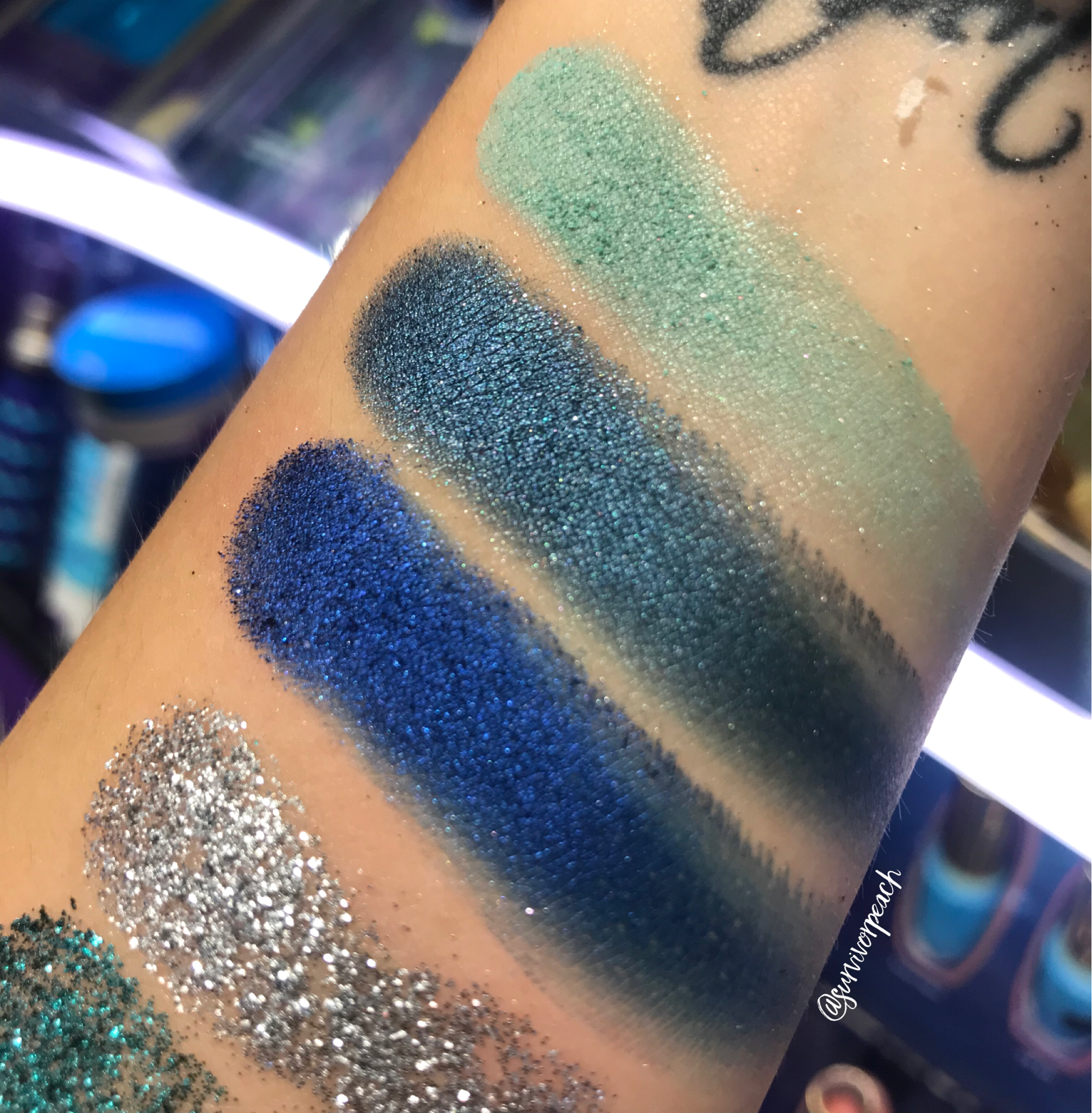 Swatches of the Tarte Rainforest of the Sea™ high tides &amp; good vibes eyeshadow palette