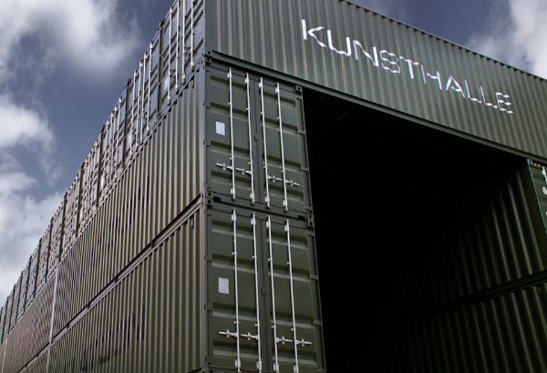 UNLIKE CITY GUIDES Platoon Kunsthalle - Canned culture
Pieced together from dozens of empty cargo containers, Platoon Kunsthalle appears an industrial anomaly. But the question of its purpose and placement is the exact point: the multi-use urban playground was formulated as an experimental think tank. Inside its walls, the community is encouraged to congregate and innovate, with exhibitions, workshops, and events. This intersection of subcultures takes on limitless forms, as it seeks to restructure the borders between the convention and its deviations.