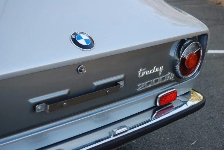 What better way to end the day than looking at one of my favorite classic cars...a 1973 2002tii Touring. Sadly never sold in the USA but this is one of a few that made it over and are now pricey collectors items. In stock silver.....