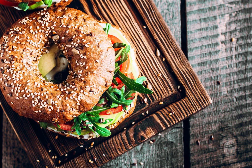 An American bagel with avocado. © Shutterstock