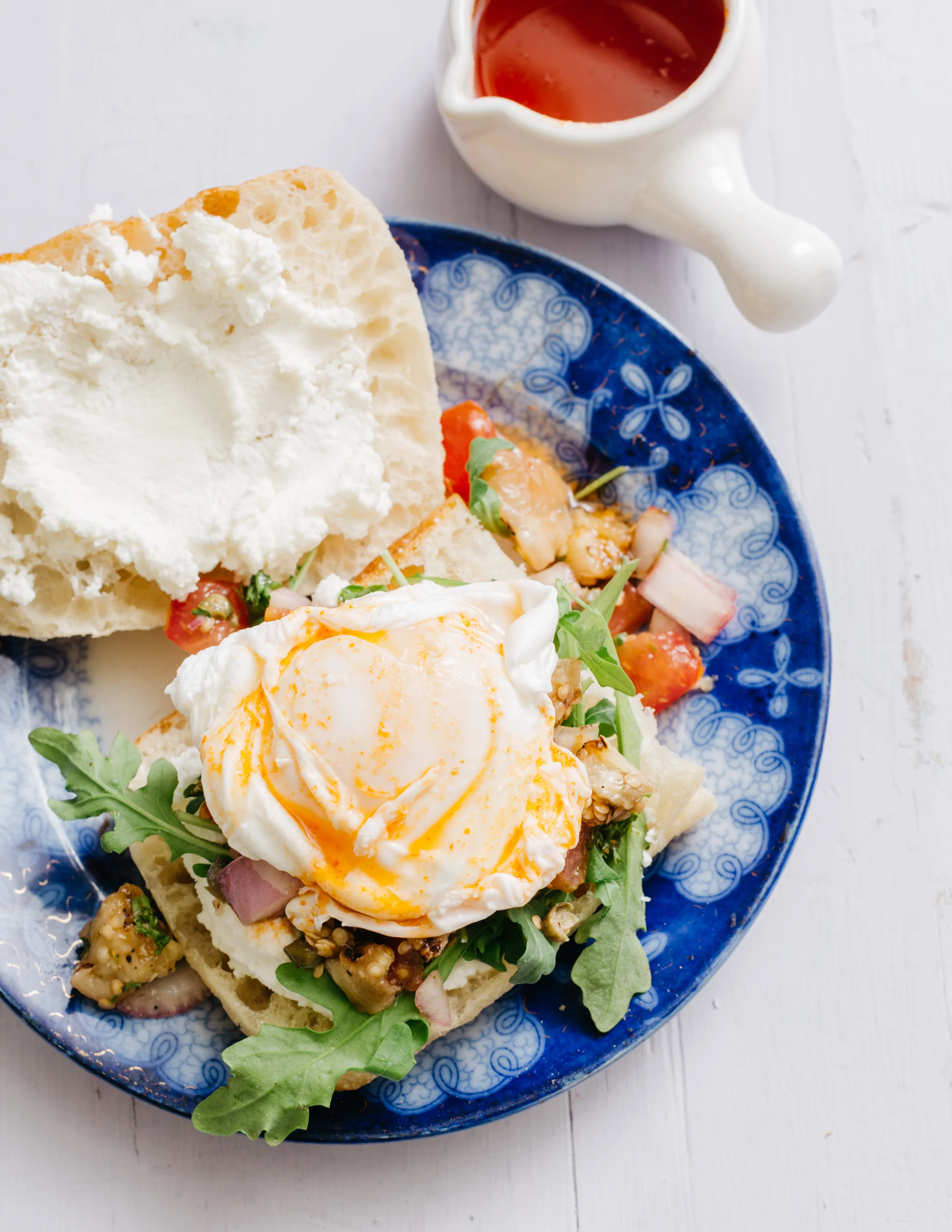 Grilled Eggplant Caponata Sandwich with Poached Egg and Sriracha